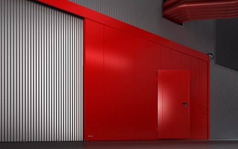 Откатные огнеупорные секционные ворота красного цвета ПВСК-7