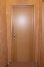 Коричневая однопольная огнестойкая дверь с МДФ